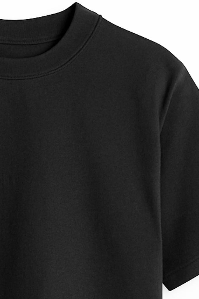 Close-up of a black t-shirt sleeve on a white background